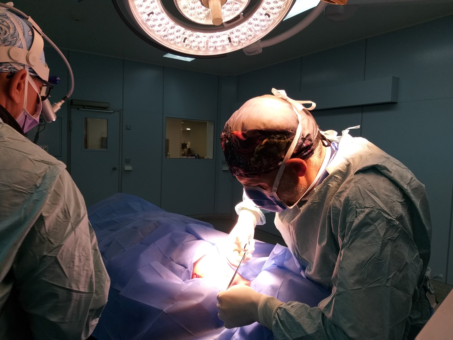 Doctors perform life-saving neurosurgery on a patient in an operating room in Venezuela.